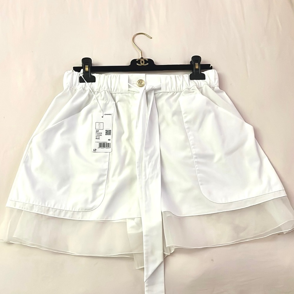 Chanel white shorts.